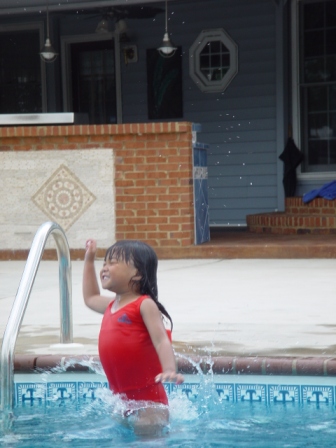 Kasen jumping in the pool